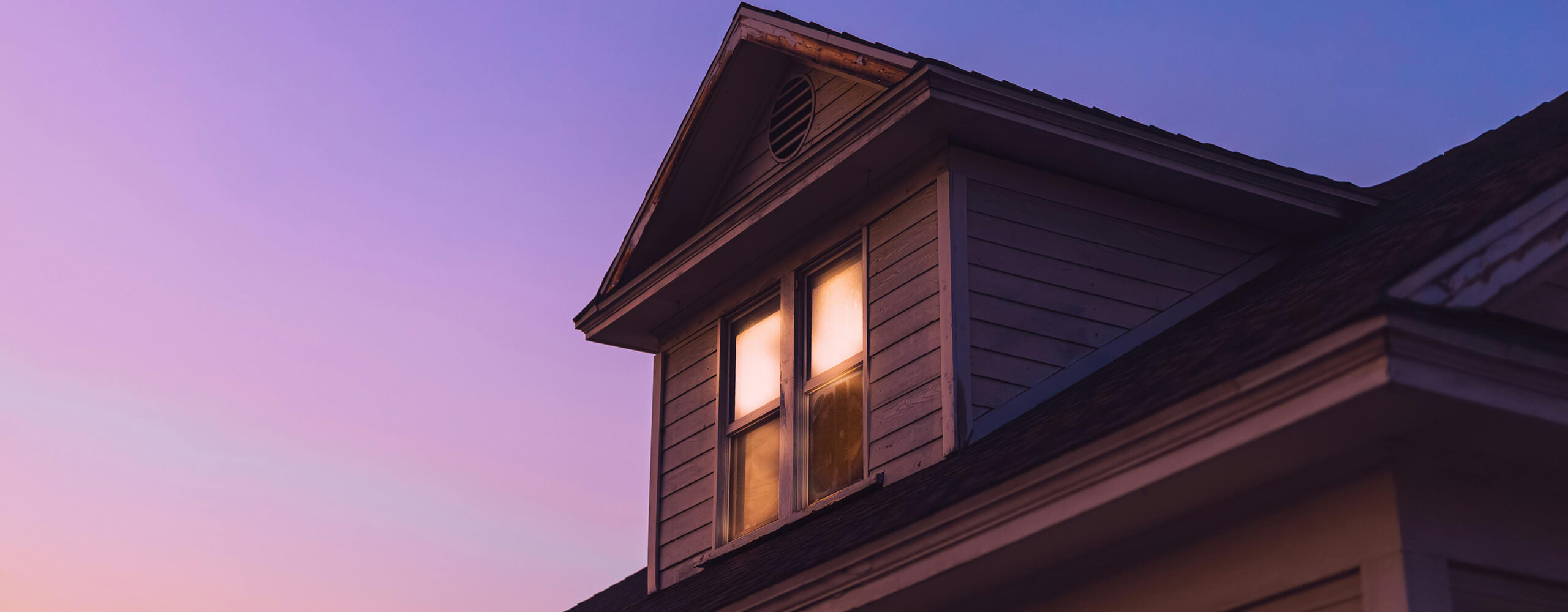 Home exterior at sunset