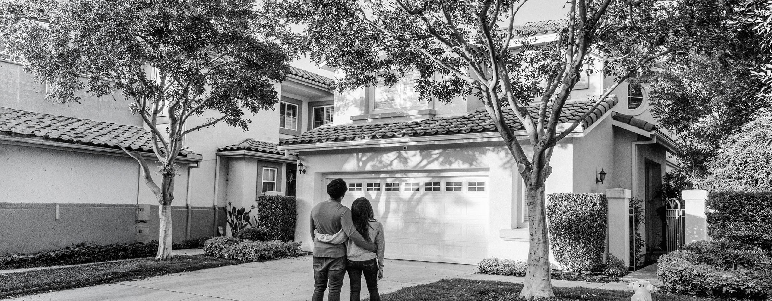 Home buyers looking at home
